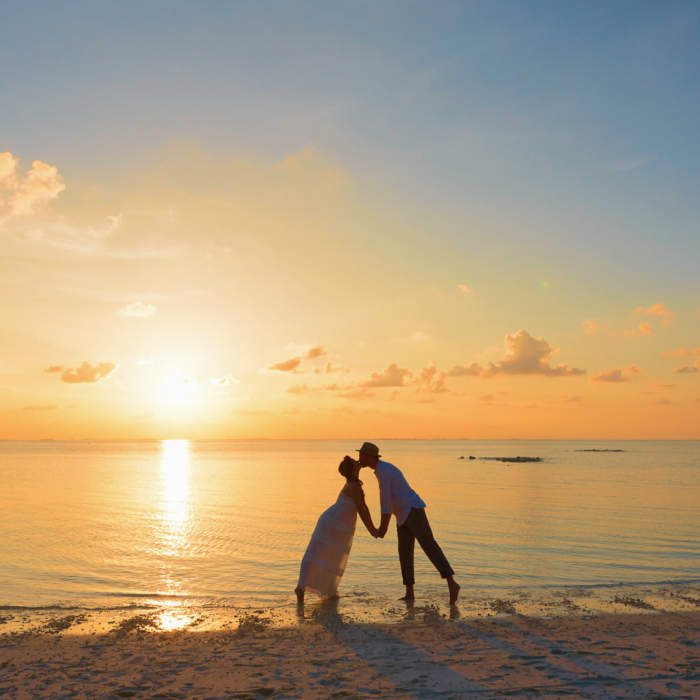 Honeymoon couple on the beach