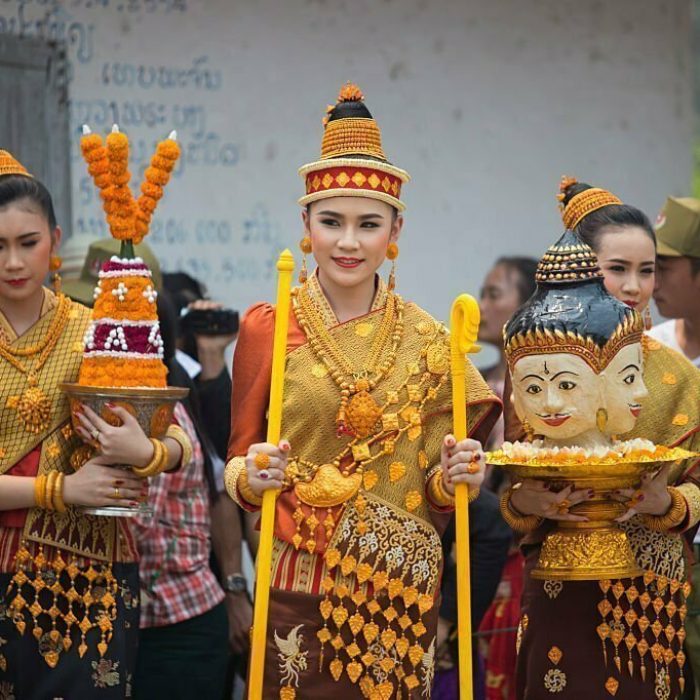 Nang Sang Khan or Miss Pi Mai Lao take part in Lao New Year procession in Luang Prabang.